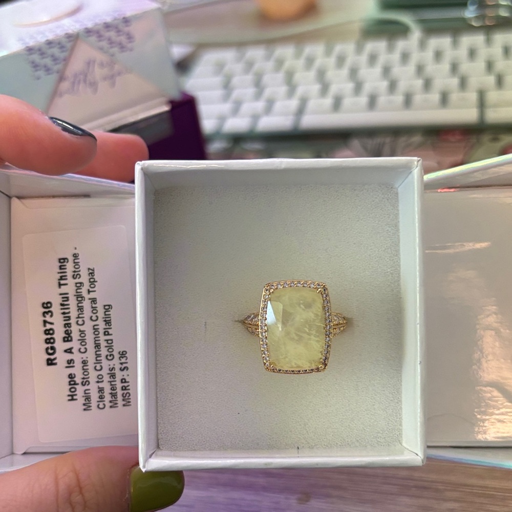 Elegant Gold and Cream Ring